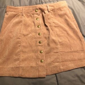 Pink suede button skirt